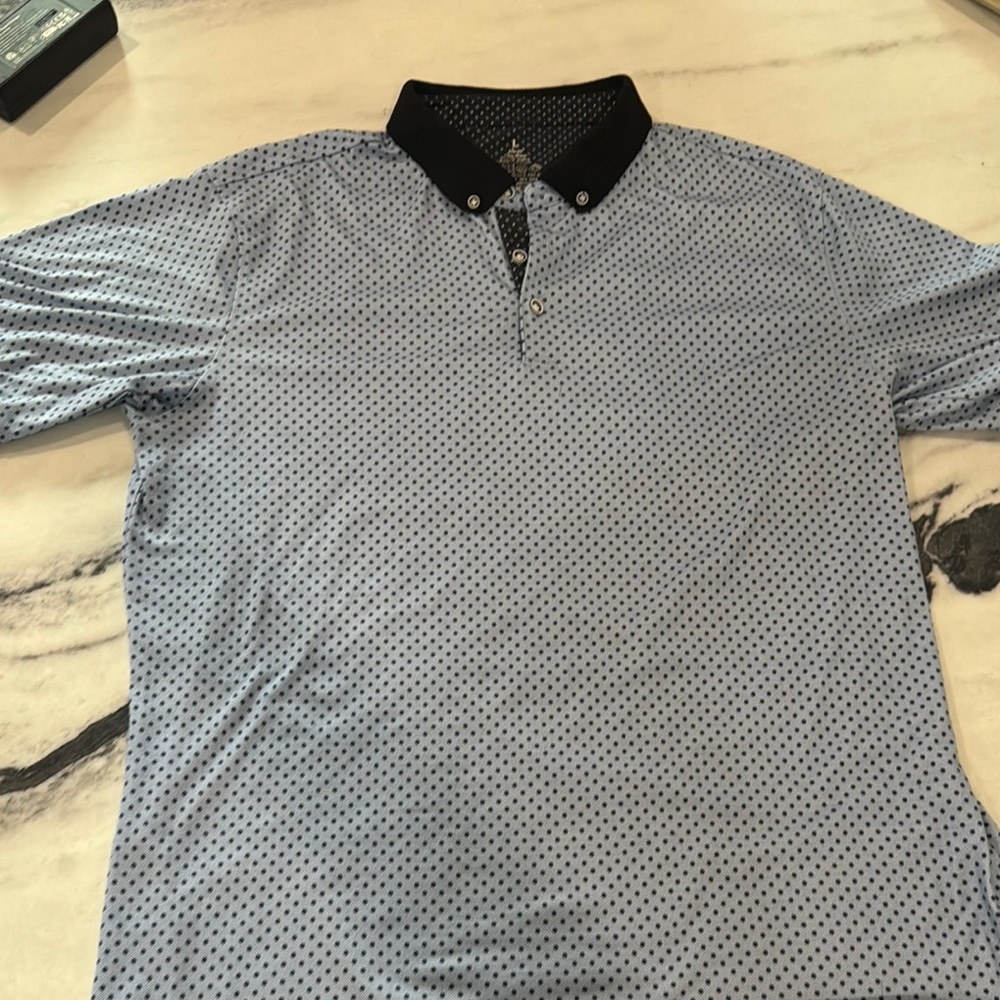Stylish Light Blue Patterned Alex Vando Men’s Golf Shirt. Moisture Whicking